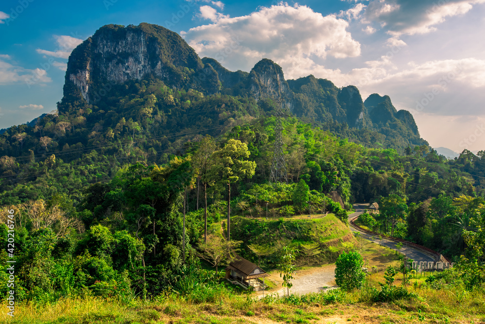 The natural background of the morning light rising in the middle of the sea and surrounded by mountains, cool breezes, the beauty of the ecology of the tourist attractions. The natural background of the morning light rising in the middle of the sea and surrounded by mountains, cool breezes, the beauty of the ecology of the tourist attractions.