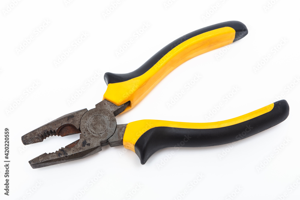Obraz premium old pliers on white background
