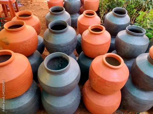 A clay water pot earthen pot for water storage Clay pots not only cool the water down, they also provide healing with the elements of earth. © saurabh