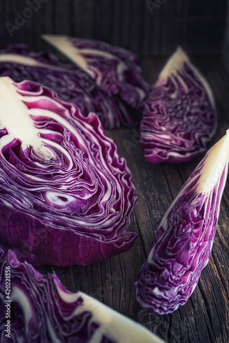 Wallpaper Mural Half and sliced fresh red cabbage on wooden rustic table. Torontodigital.ca