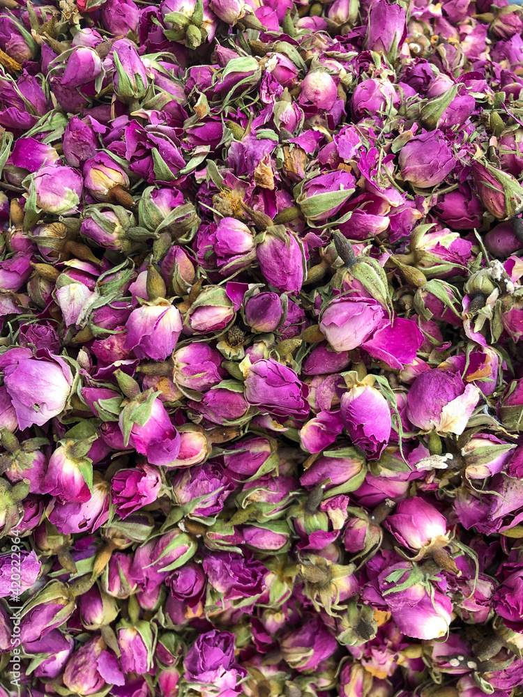 pile of dried rose flowers for herbal tea