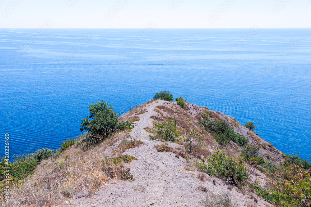 The sea coast of the Crimean peninsula with a beautiful view, on a summer sunny day.