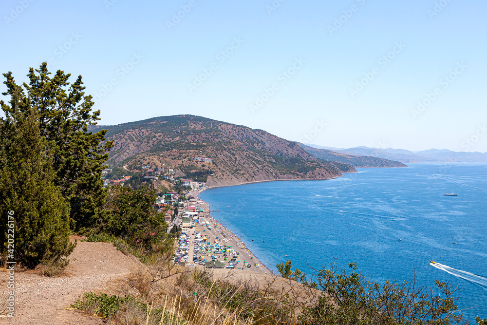 The sea coast of the Crimean peninsula with a beautiful view, on a summer sunny day.