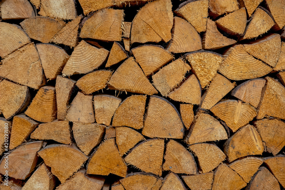 Texture of an old weathered firewood logs Texture of an old weathered firewood logs