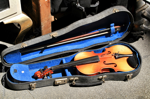 Violin for sale at a street market stall photo