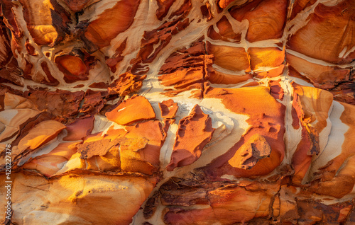 Beautiful ,coloured ,rocks on rock shelf in Bouddi National Park. Near Killcare, on the Central Coast of N.S.W. Australia. photo