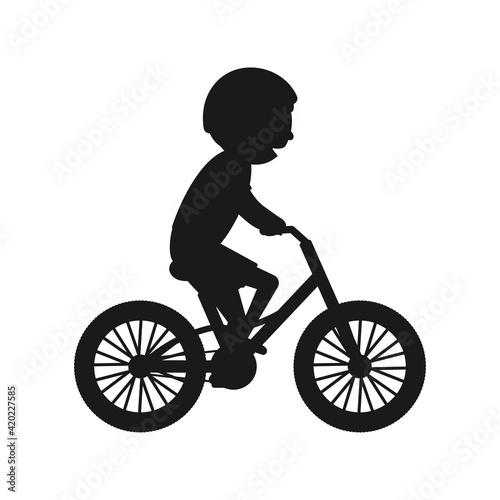 Cute boy riding bike silhouette. Healthy lifestyle in black color concept. Little child rides bicycle. Vector isolated on white	