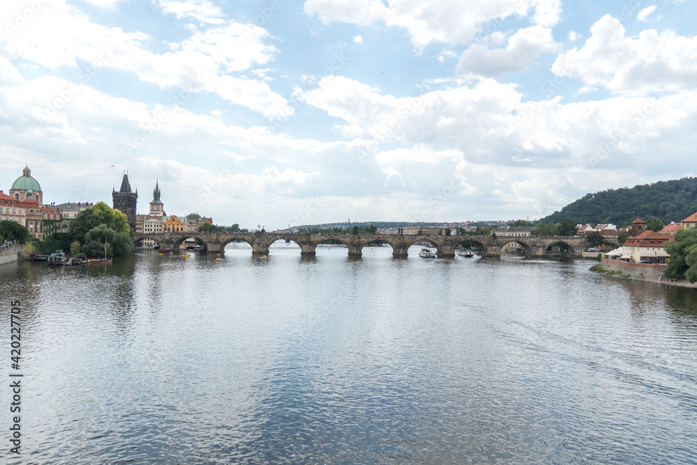 Panoramic view of the Charles Bridge, a medieval stone arch bridge that crosses the Vltava (Moldau) river in Prague, Czech Republic