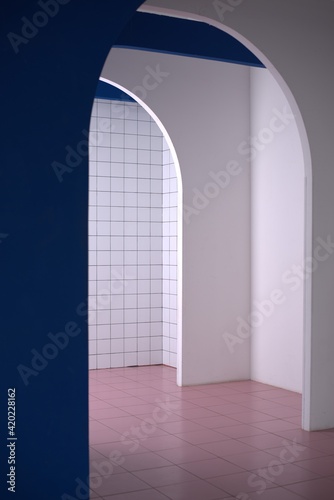 Dark and white archways, shot from the side. First perspective. White tiled wall and pink tiled floor. 