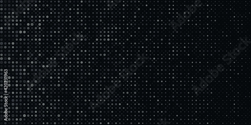 Abstract black and grey halftone dots on dark background and texture with copy space. Vector illustration