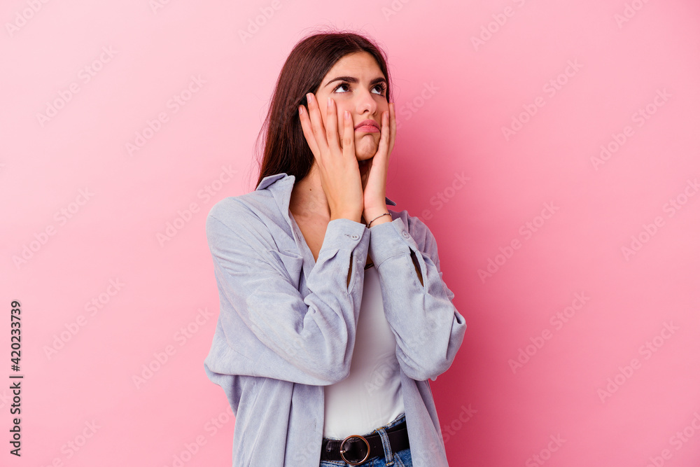 Young caucasian woman isolated on pink background whining and crying disconsolately. Young caucasian woman isolated on pink background whining and crying disconsolately.