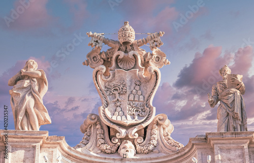 Antique Vatican symbol located in Saint Peter Square, Rome, Italy