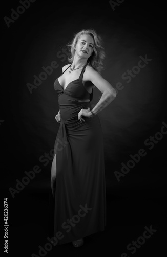 Attractive middle age woman in evening dress.