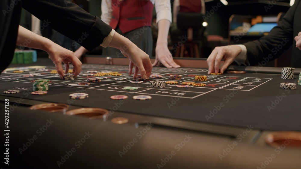 Roulette players place their bets Roulette players place their bets