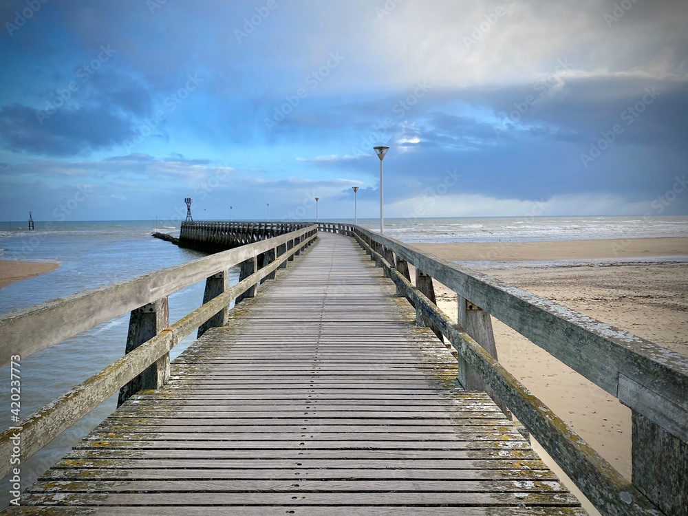 wooden pontoon on the beach