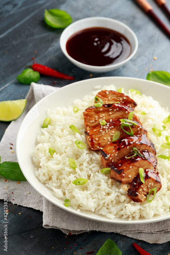 Teriyaki chicken with rice and red cabbage salad. Asian style food Teriyaki chicken with rice and red cabbage salad. Asian style food
