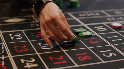 player placing bets at casino
