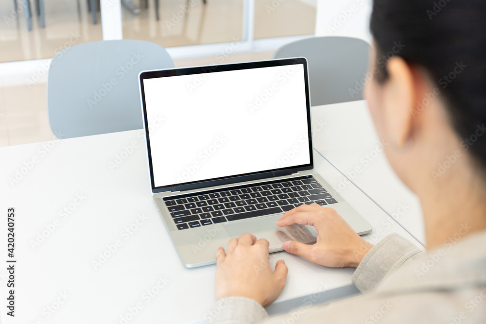 computer screen blank mockup.hand woman work using laptop with white background for advertising,contact business search information on desk at coffee shop.marketing and creative design computer screen blank mockup.hand woman work using laptop with white background for advertising,contact business search information on desk at coffee shop.marketing and creative design