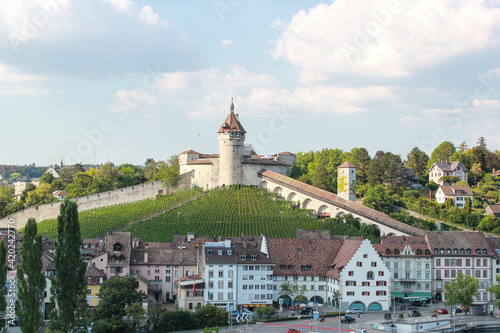 Schaffhausen, Switzerland. Munot fortress overlooks the river rhin and the village of Schaffhausen surrounded by vineyards photo