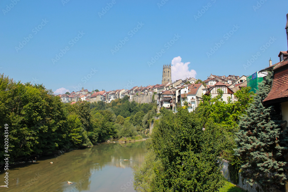 Cityscape of the old city Fribourg, Freiburg, and the Sarine river, Switzerland. 