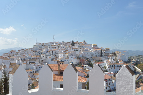 Battlements on a fortified wall in Comares town a sunny day photo