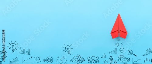 Business success, innovation and solution concept, Red paper plane and business strategy on blue background, copy space photo