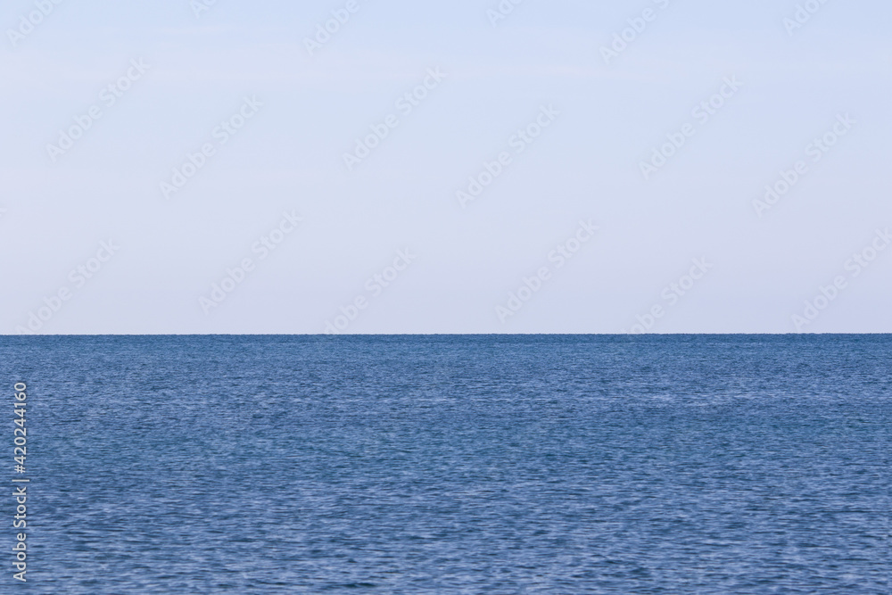 Obraz premium Blue sea background..Horizon of the blue sea.Travel destination concept