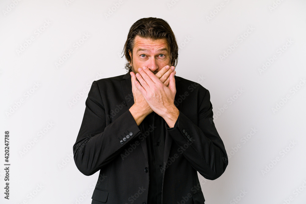Middle age business dutch man isolated on white background shocked covering mouth with hands. Middle age business dutch man isolated on white background shocked covering mouth with hands.
