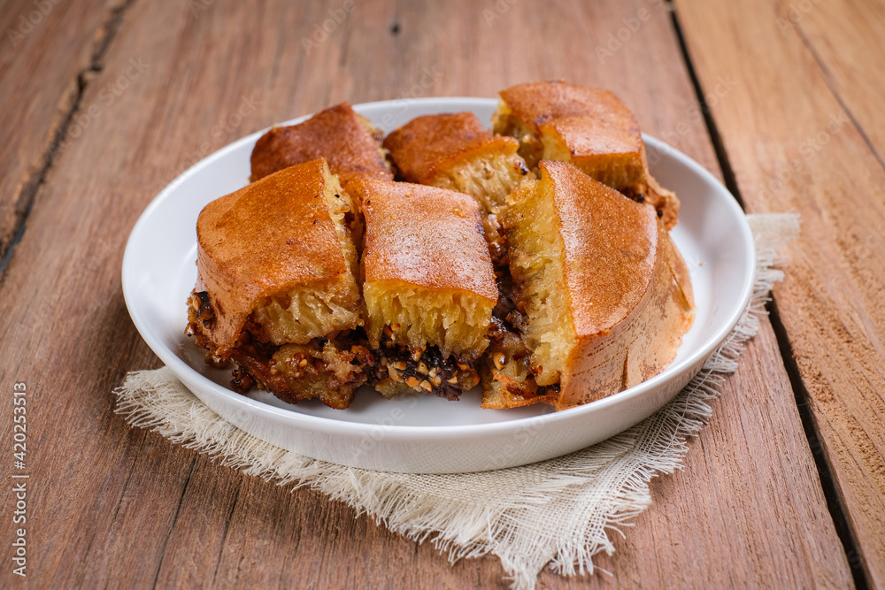 Martabak manis is Indonesian stuffed sweet pancake filled with roasted peanut and chocolate Martabak manis is Indonesian stuffed sweet pancake filled with roasted peanut and chocolate