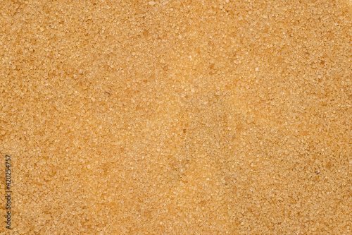 Closeup cane sugar background, texture.