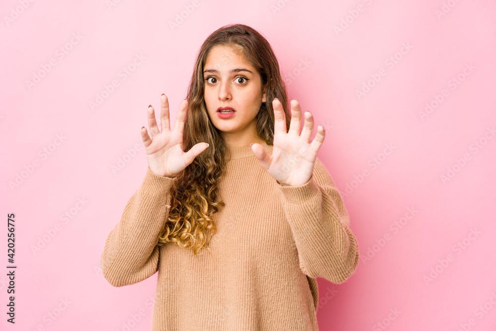 Young caucasian woman being shocked due to an imminent danger Young caucasian woman being shocked due to an imminent danger