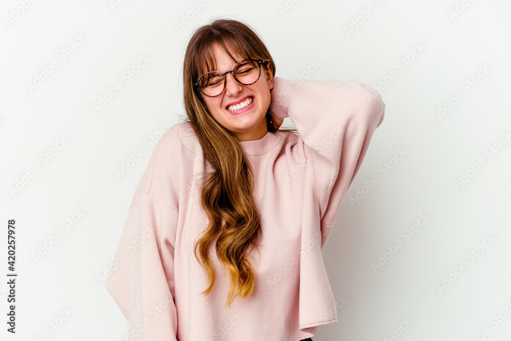 Young caucasian cute woman isolated on white background suffering neck pain due to sedentary lifestyle. Young caucasian cute woman isolated on white background suffering neck pain due to sedentary lifestyle.