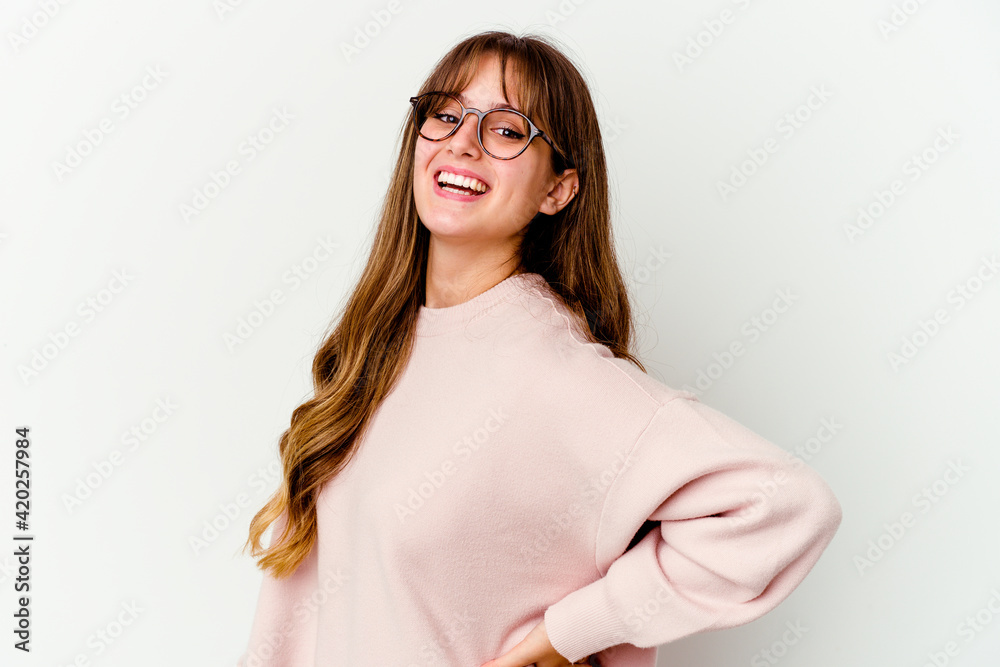 Young caucasian cute woman isolated on white background confident keeping hands on hips.
