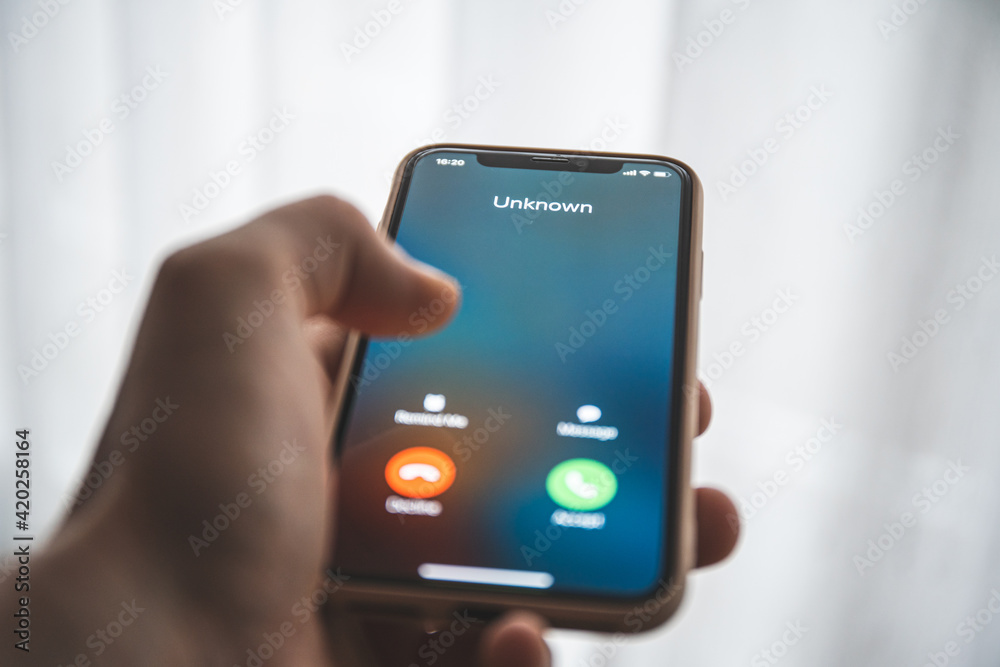 Incoming call from unknown number. Scam online on phone Incoming call from unknown number. Scam online on phone