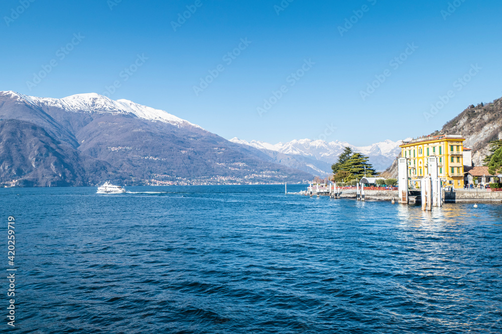 The Varenna pier with the snow-capped alps in the background