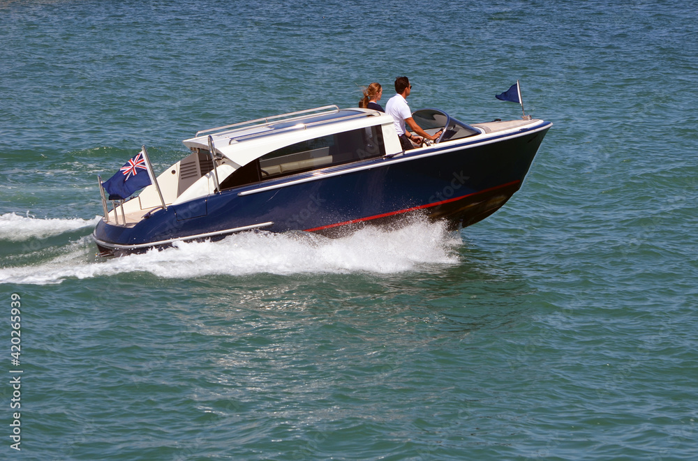 Fototapeta premium High-end motor boat speeding on the Florida Intra-Coastal Waterway near Miami Beach.