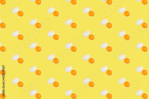 Pattern with eggs on the yellow background