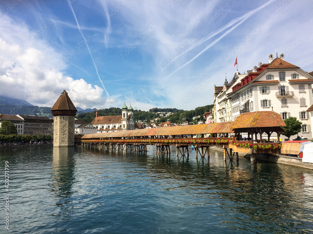 
Panoramic view of the old town of lucerne with the famous wooden bridge over the Reuss river
