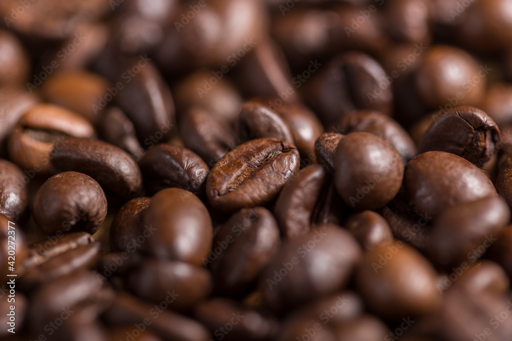 Roasted coffee beans. Bokeh food texture. Roasted coffee beans. Bokeh food texture.