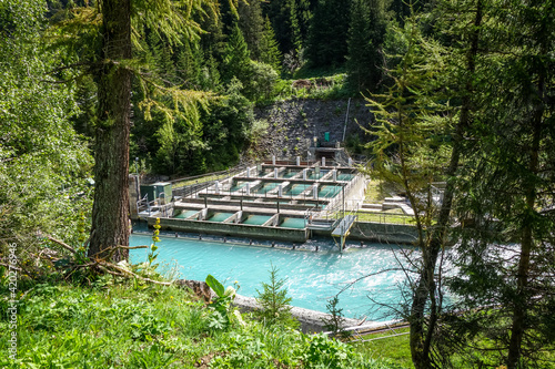 hydroelectric power plant on Doron river in Vanoise national Park valley, France photo
