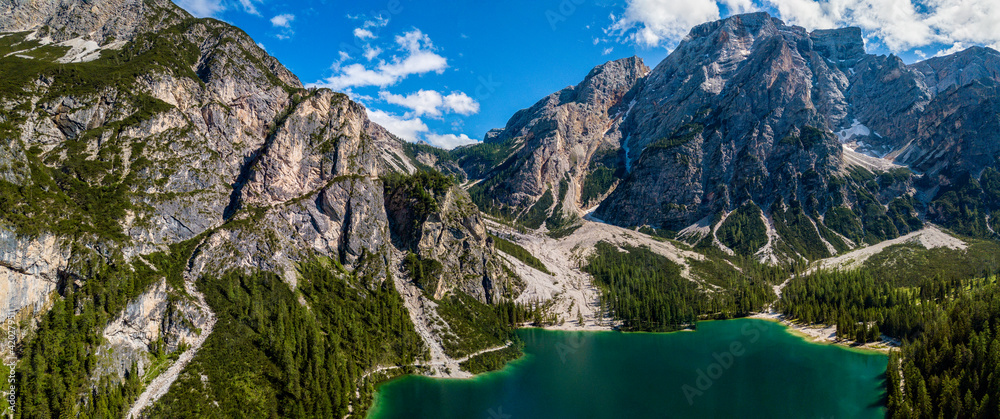 Aerial view of the Lake Braies, Pragser Wildsee is a lake in the Prags Dolomites in South Tyrol, Italy. View of Croda del Becco mountain in the background
