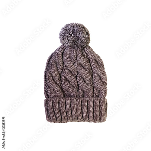 Accessories in the cold season. Knitted gray hat with pompon isolated on a white background