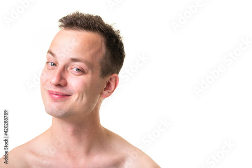 Portrait of a handsome young man on white background, making funny faces