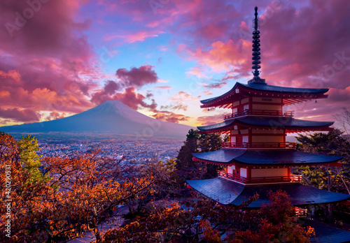 Japan traditional temple. Fujiyoshida city view. Japanese city at foot of Fujiyama. Fujiyama volcano in autumn day. Japan traditional architecture. Landscape from Buddhist Pagoda. Regions of Japan