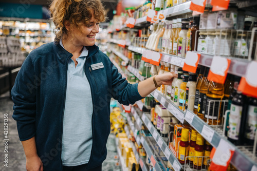 Woman working in supermarket