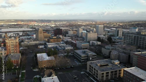 Cinematic drone shot of downtown Tacoma, harbor, dome, Commencement Bay, Puget Sound, Tacoma, a large city near Seattle in Western Washington, Pacific Northwest, economic center of Pierce County photo