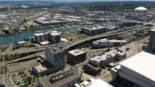 Cinematic drone footage of the Greater Tacoma Marriott Convention Center downtown Tacoma, a large city near Seattle in Western Washington, Pacific Northwest, the economic center of Pierce County photo