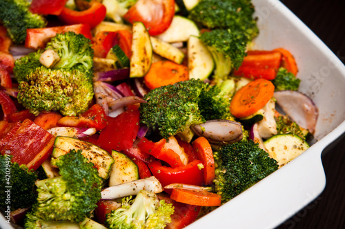 Fried chicken stripes with vegetables dish