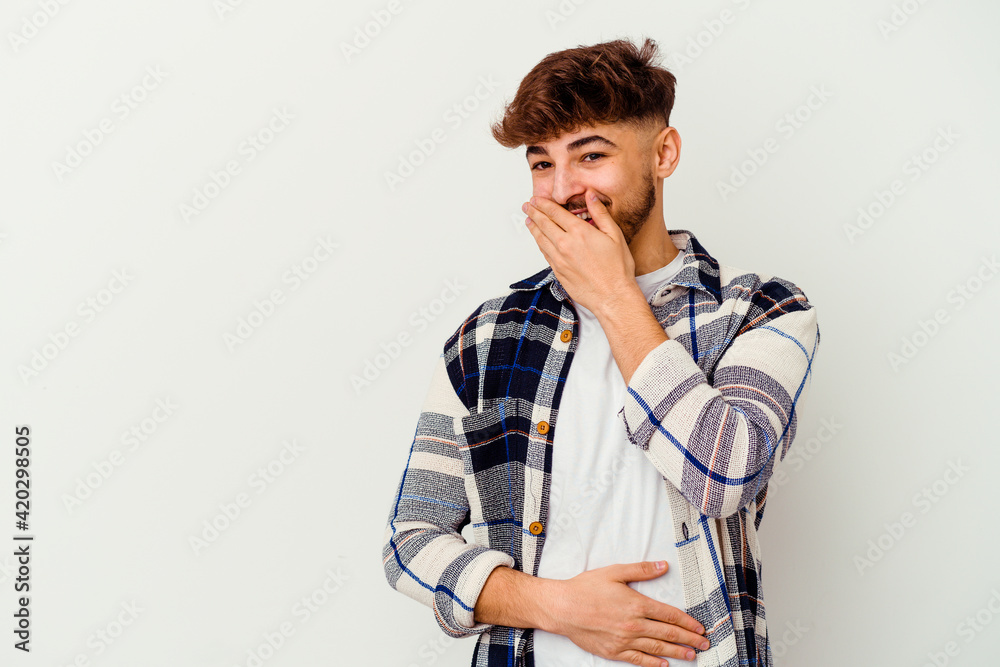 Young Moroccan man isolated on white background laughing happy, carefree, natural emotion. Young Moroccan man isolated on white background laughing happy, carefree, natural emotion.