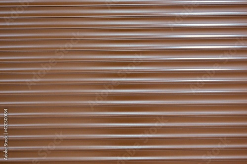 Brown roller shutters wall pattern